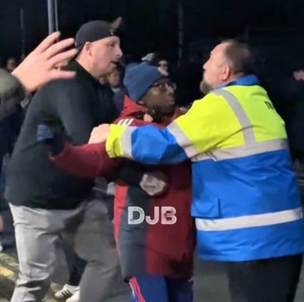 Post: Well-known Arsenal fans clashed with Sunderland fans and were grabbed by security personnel and pushed